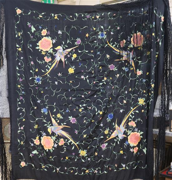 A Chinese embroidered silk shawl.